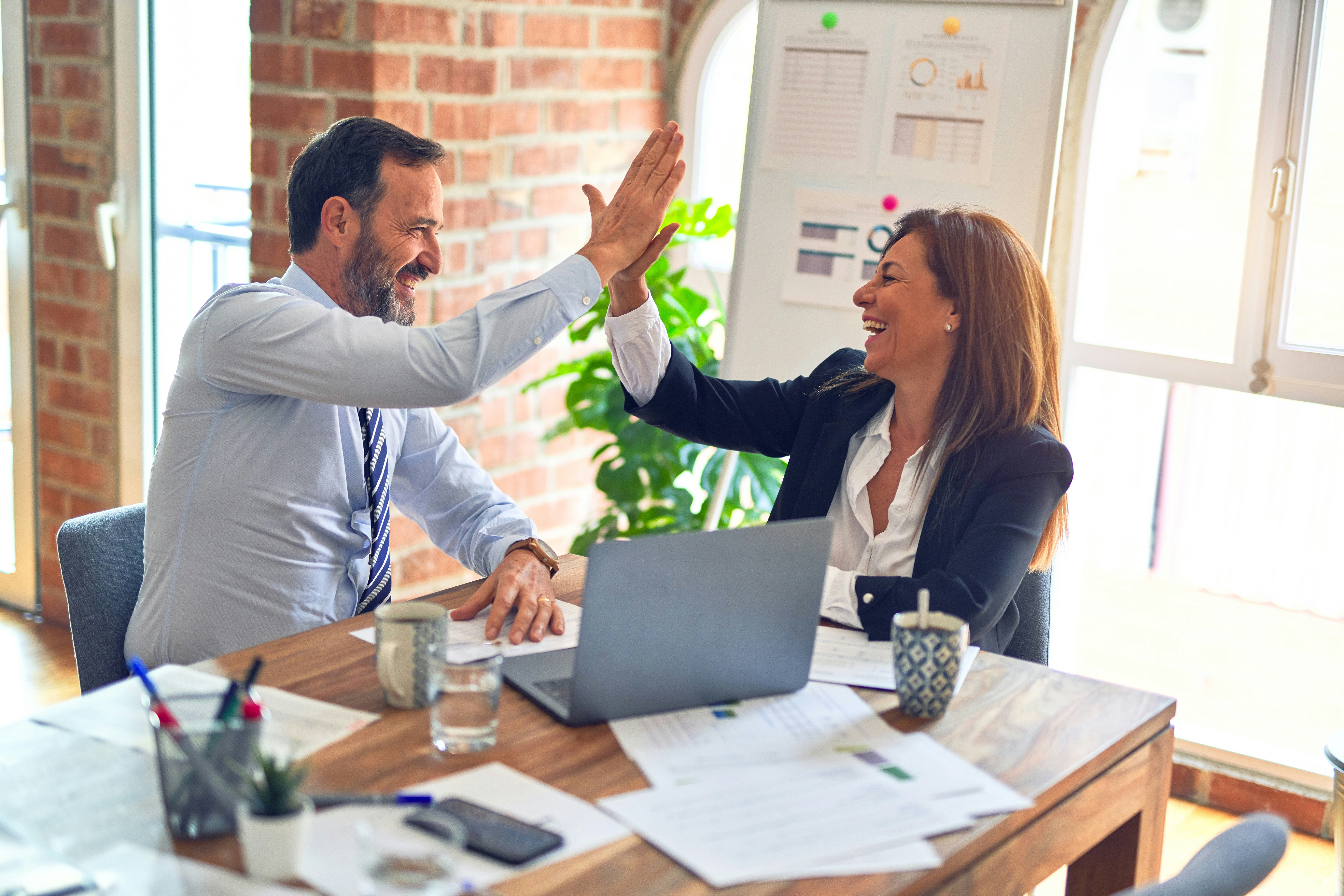 Small business owner meeting with SEO consultant